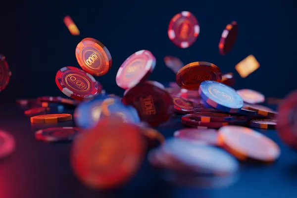 A man focused on his laptop with live stats in the background, highlighting the dedicated sports and gaming features of the 77HI mobile app.