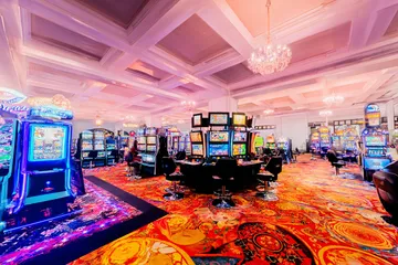 A laptop glowing with a bright login prompt in a minimalistic setup, symbolizing the protected access system at 77HI.